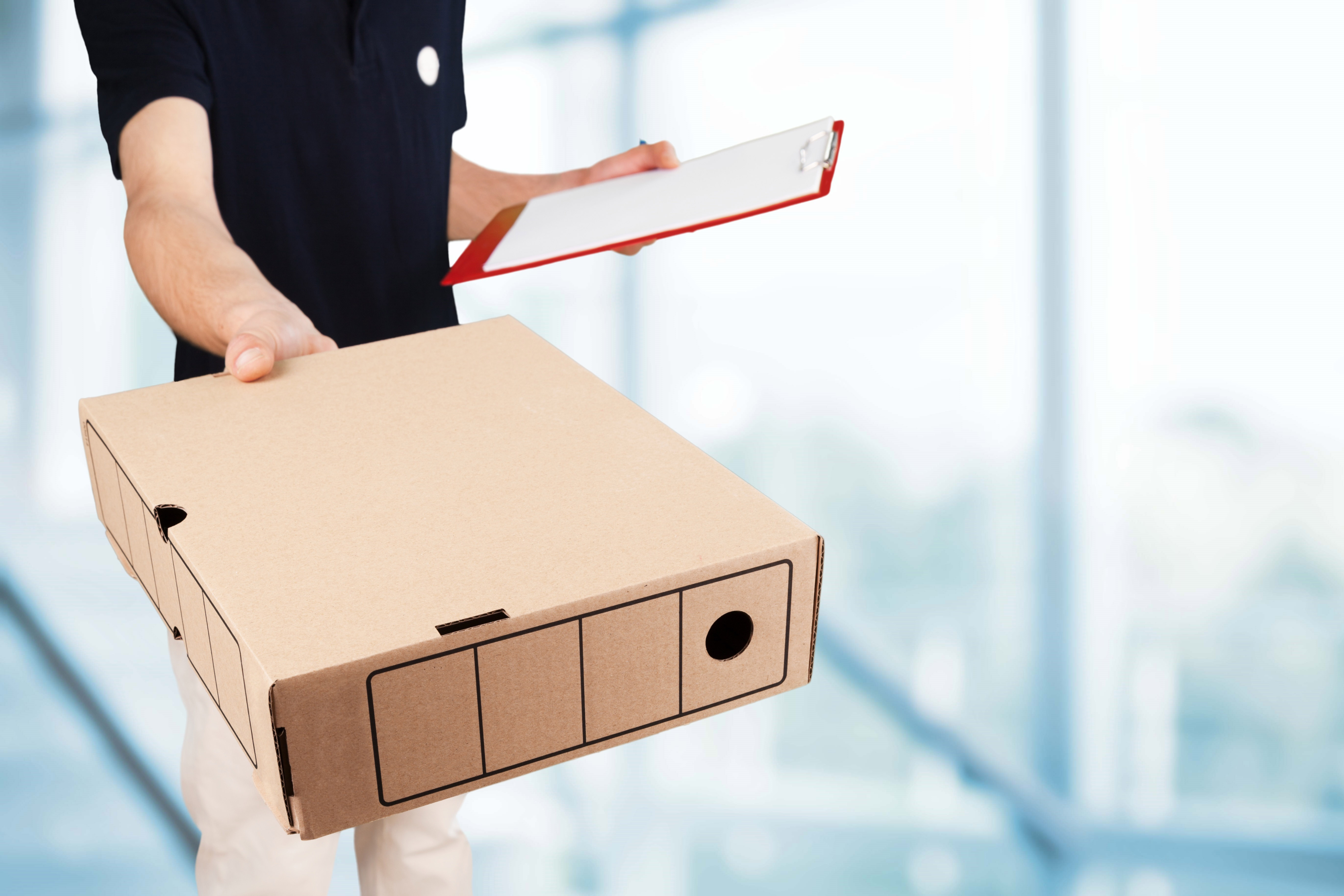 Courier Handing Packing Out to Customer - Mailing Methods